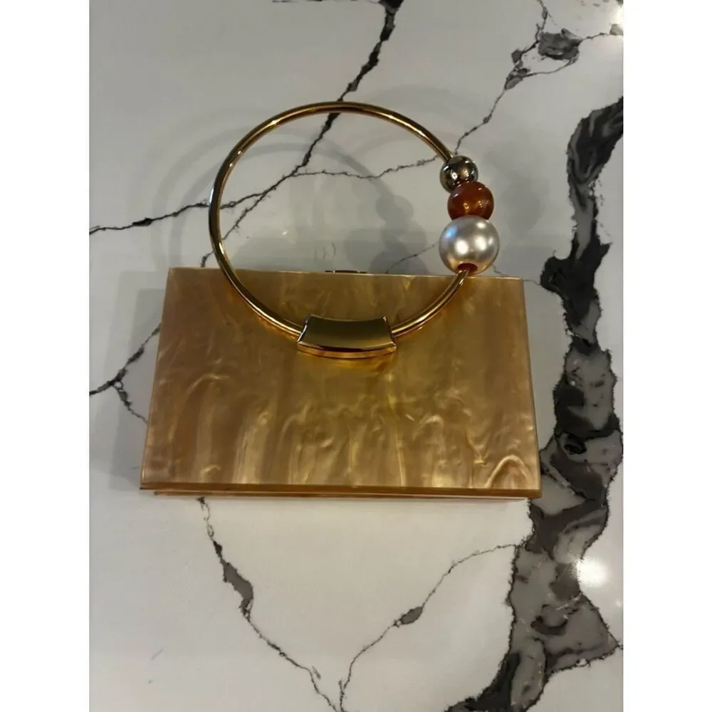 Lulu's Pearlescent Pink Acrylic Box Clutch with Gold Ring Handle